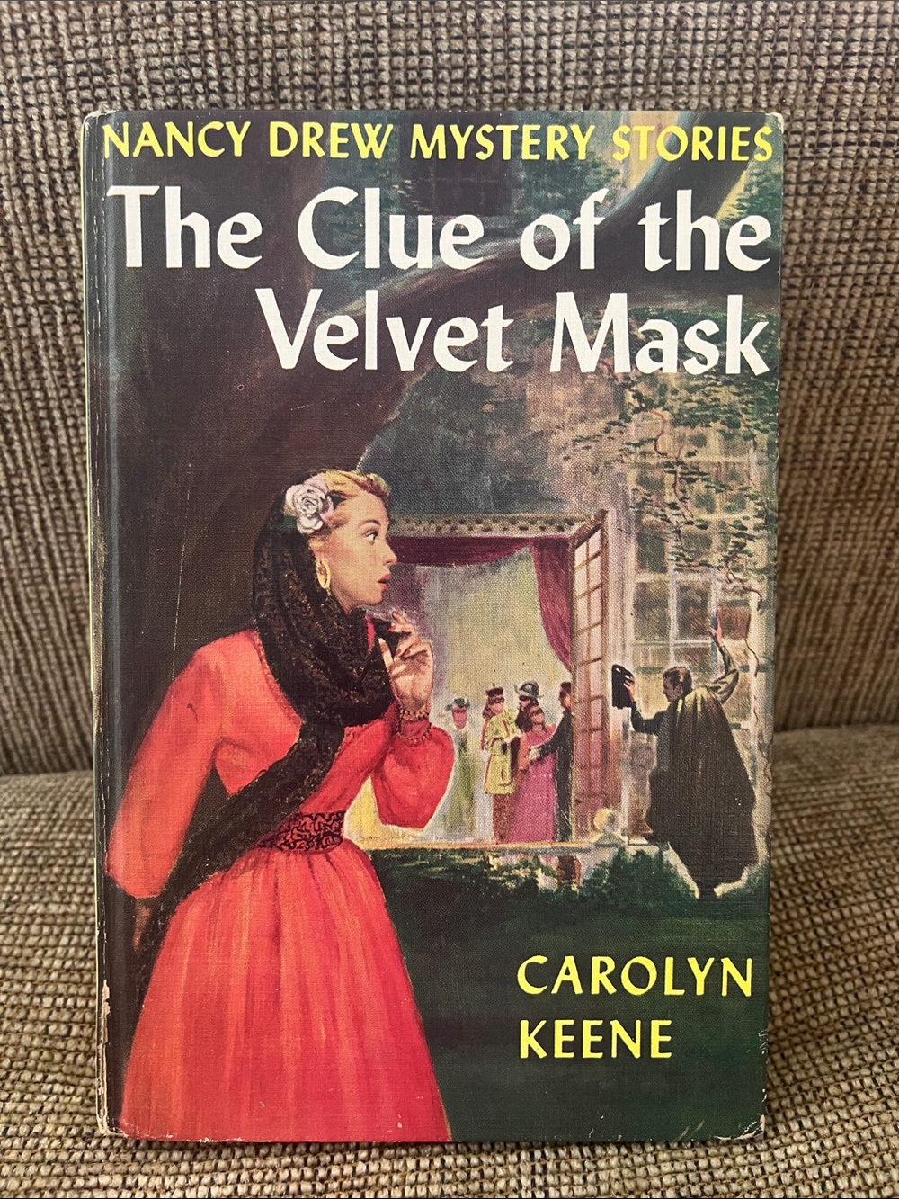 Vintage hardcover copy of The Clue of the Velvet Mask by Carolyn Keene